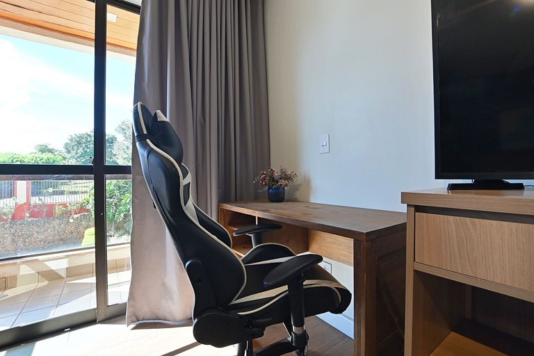 Charmoso flat 105 beira lago